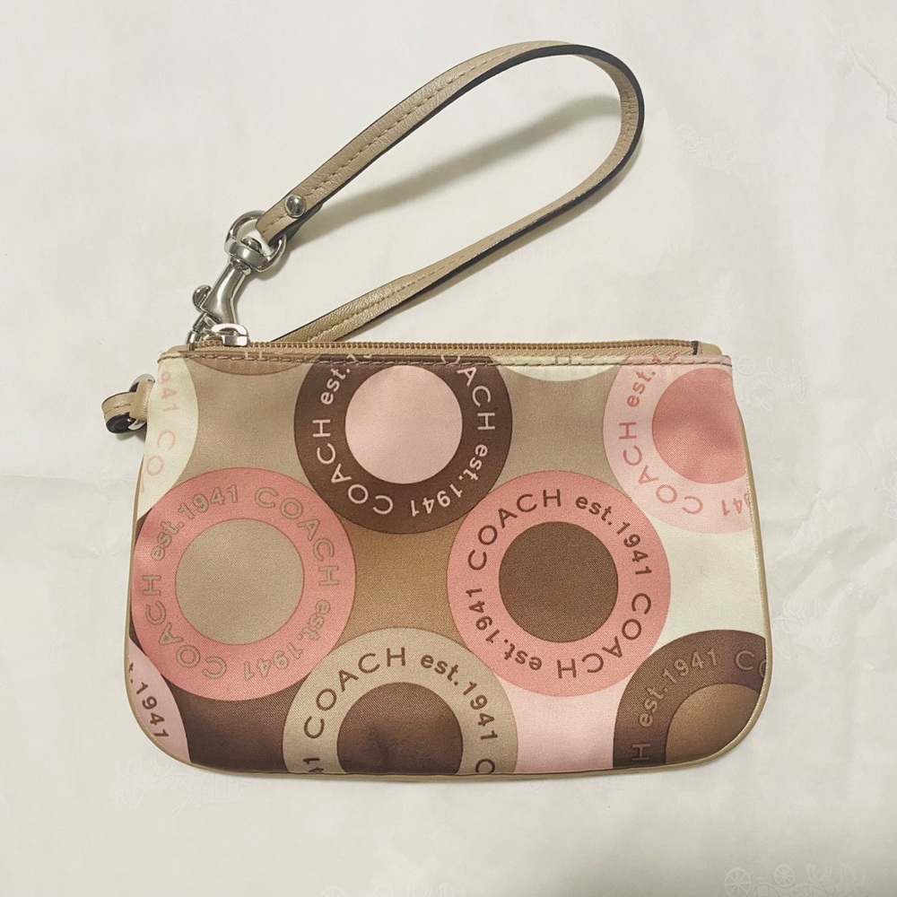 Coach 1941 wristlet wallet clutch in pink tan color